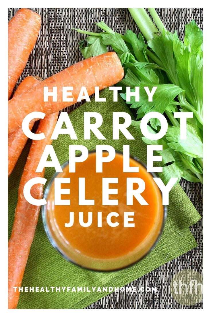 Overhed view of a glass of Healthy Homemade Carrot Apple Celery Juice with raw carrots and celery on the side