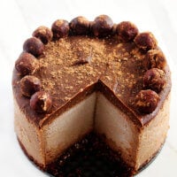 This Gluten-Free Vegan No-Bake Chocolate Peanut Butter Cheesecake recipe is a healthy yet decadent dessert! Raw, Vegan, Gluten-Free, Dairy-Free, Egg-Free, Soy-Free, No-Bake and No Refined Sugar! | The Healthy Family and Home #rawfoods #vegan #dairyfree #glutenfree #grainfree #dessert #cheesecake #vegancheesecake #chocolate #peanutbutter #healthyrecipe #healthydessert #nobake #nobakedessert #recipe #healthyrecipe #healthy