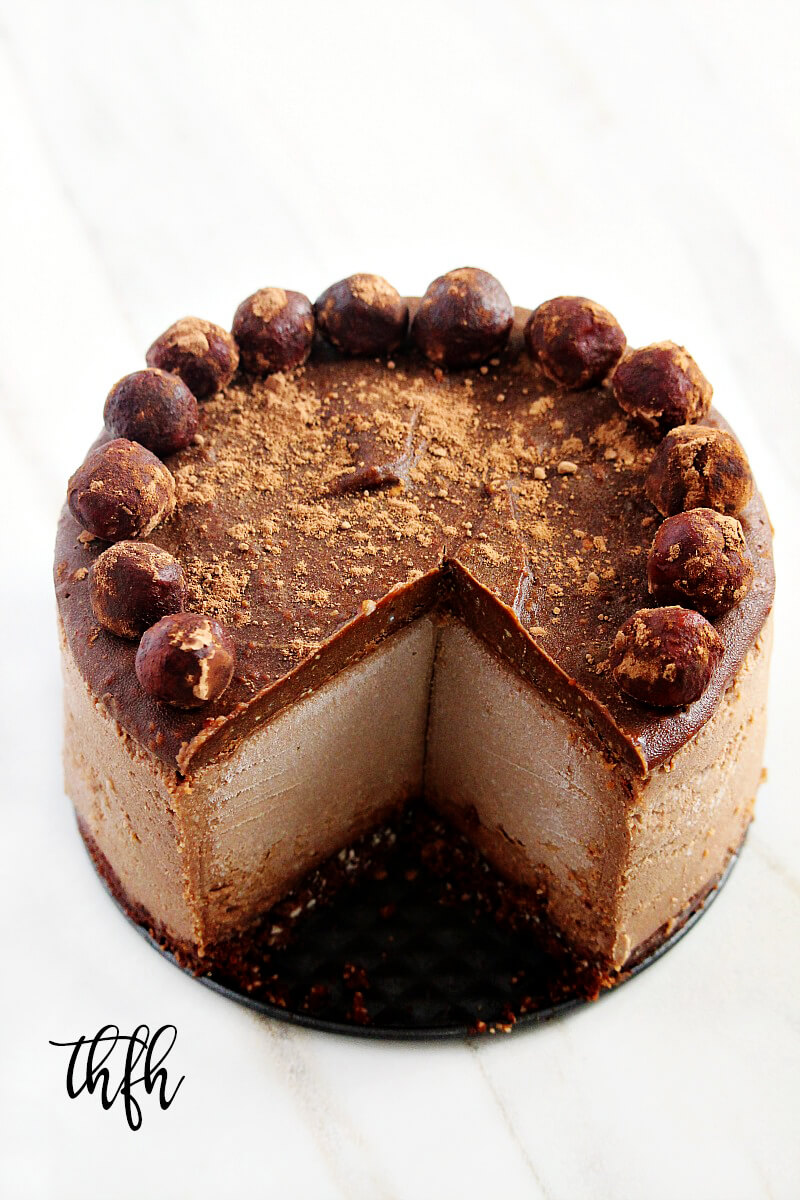 This Gluten-Free Vegan No-Bake Chocolate Peanut Butter Cheesecake recipe is a healthy yet decadent dessert! Raw, Vegan, Gluten-Free, Dairy-Free, Egg-Free, Soy-Free, No-Bake and No Refined Sugar! | The Healthy Family and Home #rawfoods #vegan #dairyfree #glutenfree #grainfree #dessert #cheesecake #vegancheesecake #chocolate #peanutbutter #healthyrecipe #healthydessert #nobake #nobakedessert #recipe #healthyrecipes #healthy