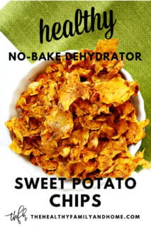 Close-up overhead image of a small white bowl filled with Gluten-Free Vegan Dehydrated Sweet Potato Chips with a green napkin in the background with text overlay